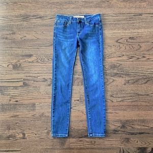 Jeans there just dark blue and the brand is Joes